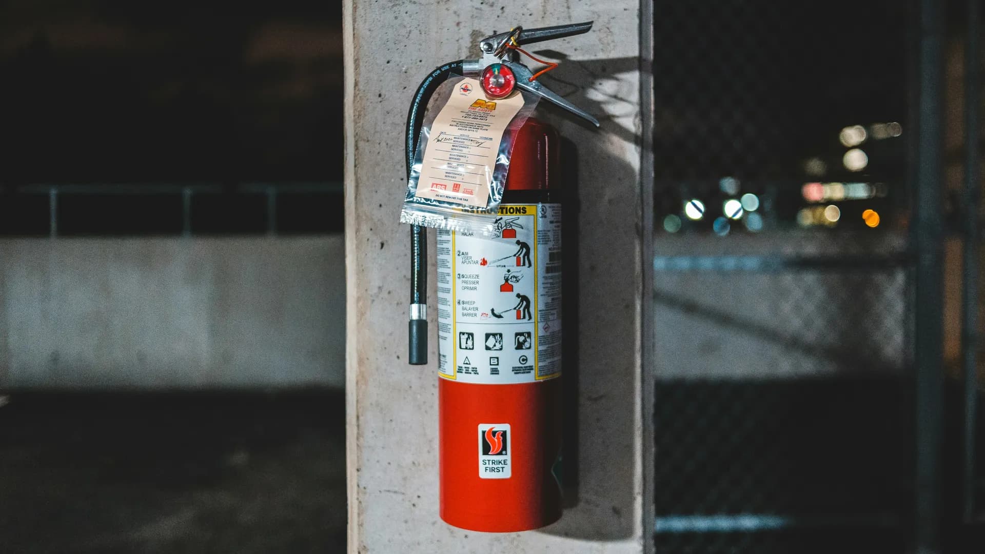 A serviced extinguisher with its dated inspection tag